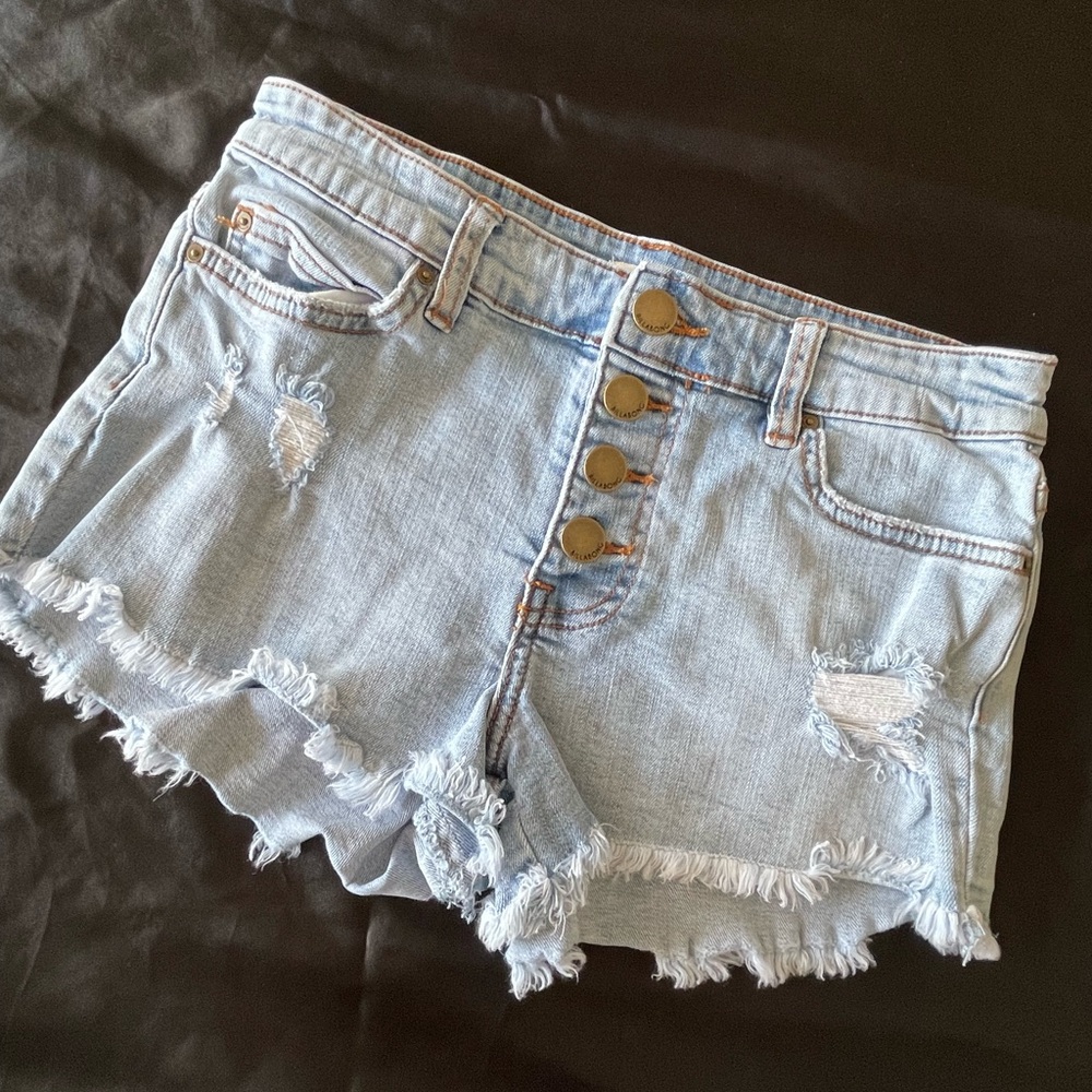 Used-Billabong Jean shorts size 24 with 4 buttons on front side